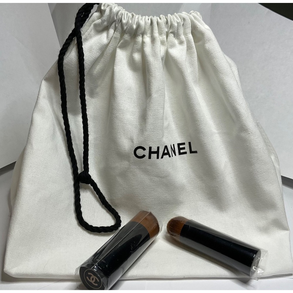 LOT 2 CHANEL TRAVEL BRUSHES w/ WHITE CHANEL DRAWSTRING CANVAS BAG